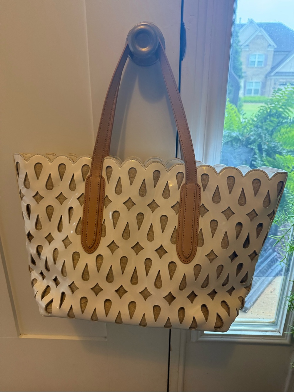 Sondra Robert’s White Laser-Cut Tote Bag with Tan Handles